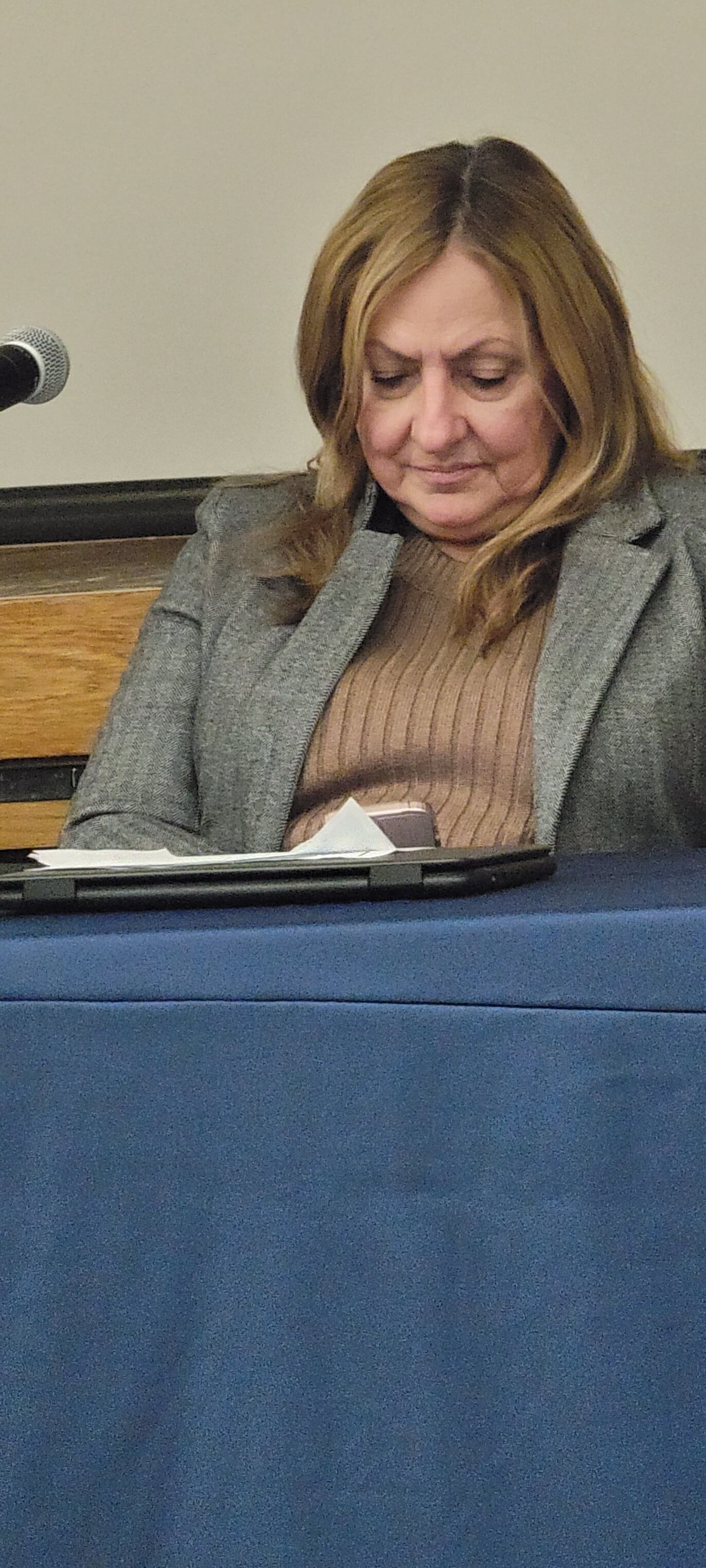 Jean Barrett on her phone